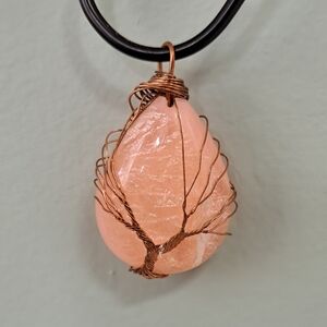 Vintage pink and iridescent blue teardrop pendant in rose gold wire